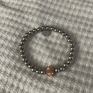 Rustic Cuff Ireland silver beaded bracelet with rose gold ball.
